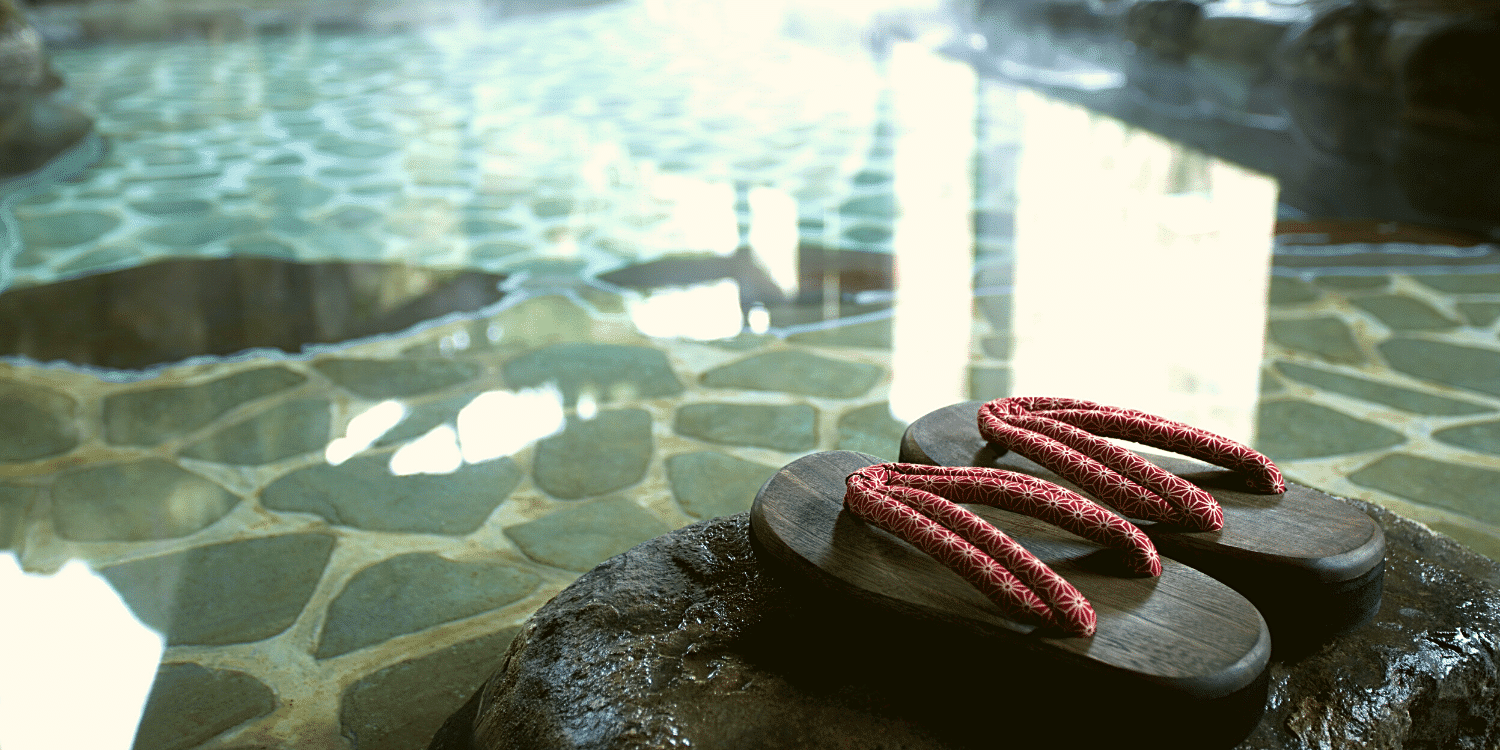 A pair of Japanese sandels by some hot springs in Costa Rica